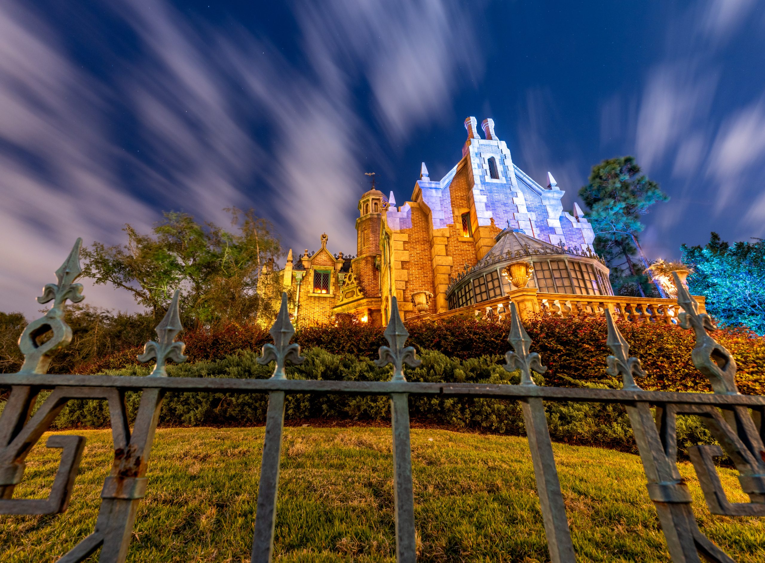 Haunted Mansion exterior at night