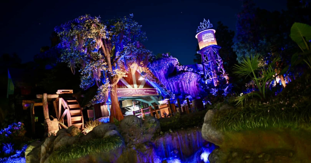 tiana's bayou adventure, tiana's bayou adventure exterior at night in disneyland