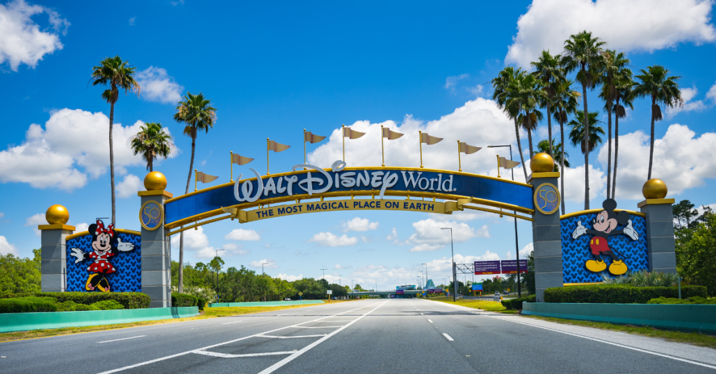driving to disney world, welcome arch entrance to disney world resort