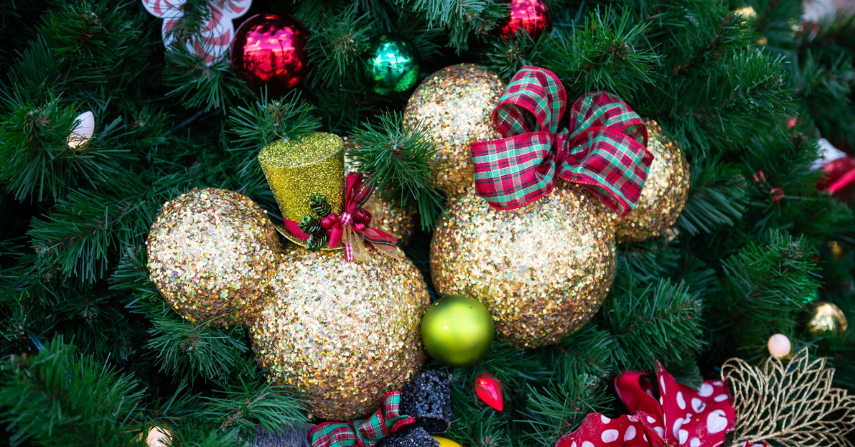 disney world holidays, ornaments on a christmas tree on the christmas tree trail at disney springs