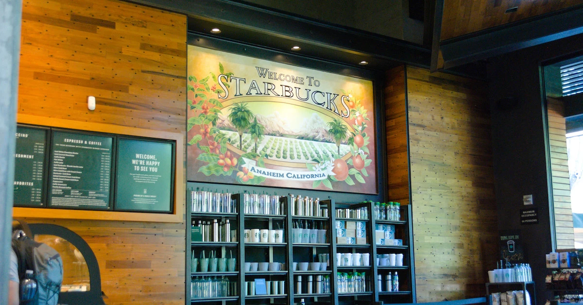 102821_Disneyland-Campus_Downtown-Disney_Starbucks-Anaheim-Mural-2_Kurdt-Long (FI) Starbucks at Downtown Disney, Disneyland Resort, interior welcome sign
