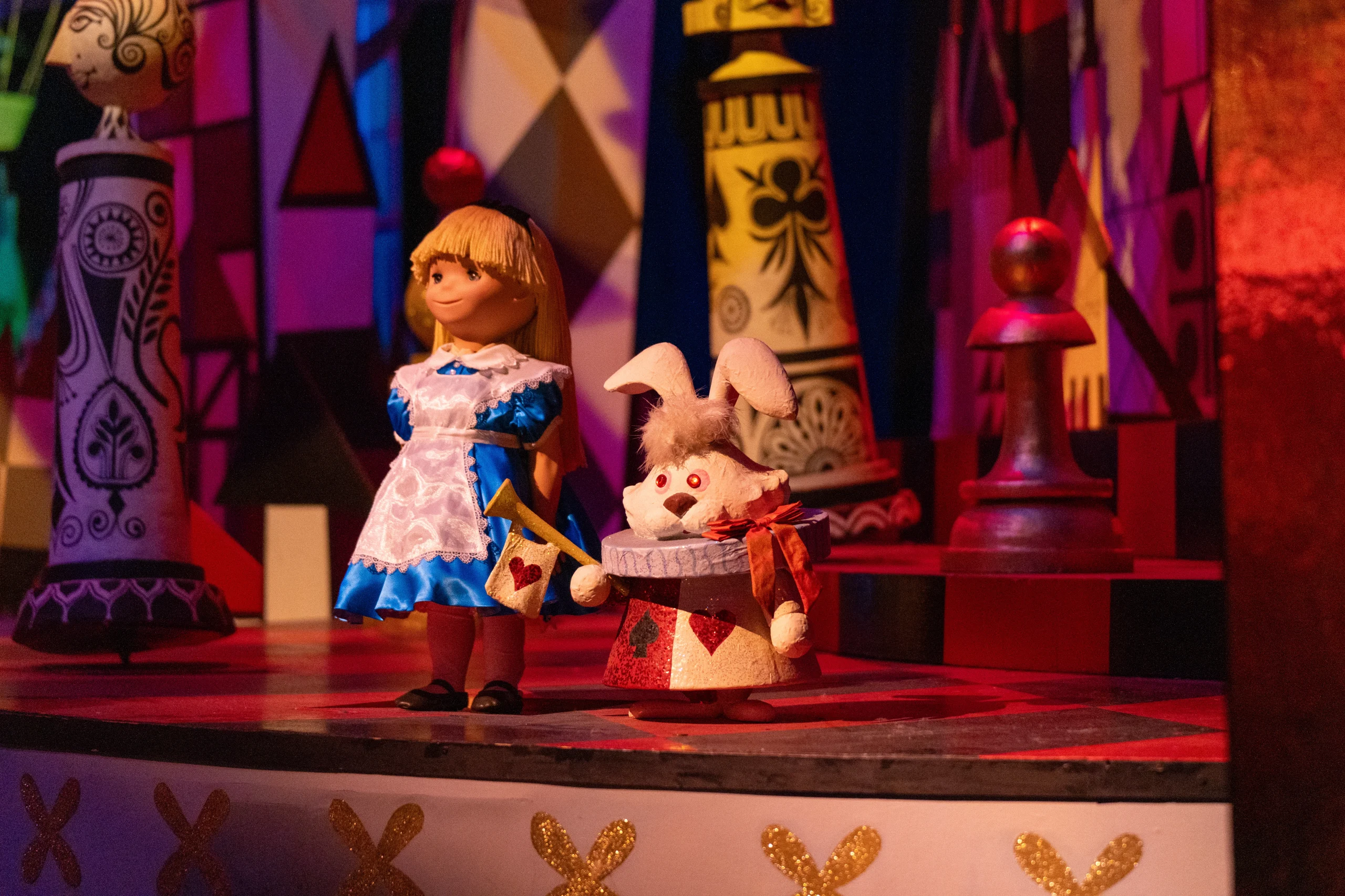 Alice and the White Rabbit inside Disneyland's "it's a small world" ride