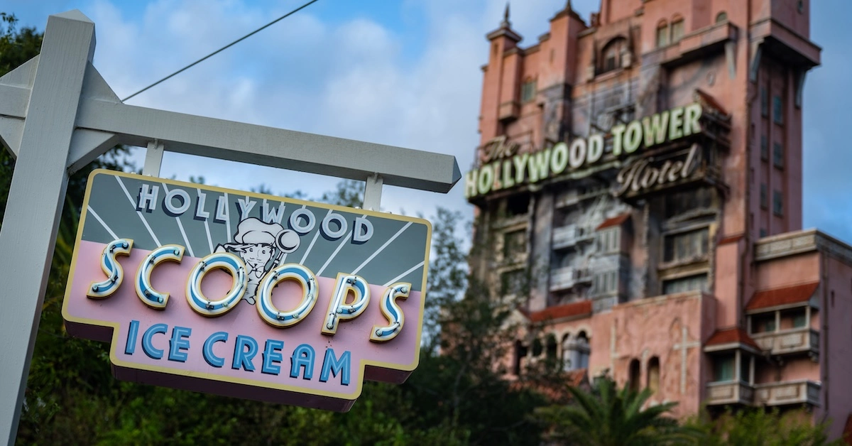 Hollywood Scoops sign with Tower of Terror in the background