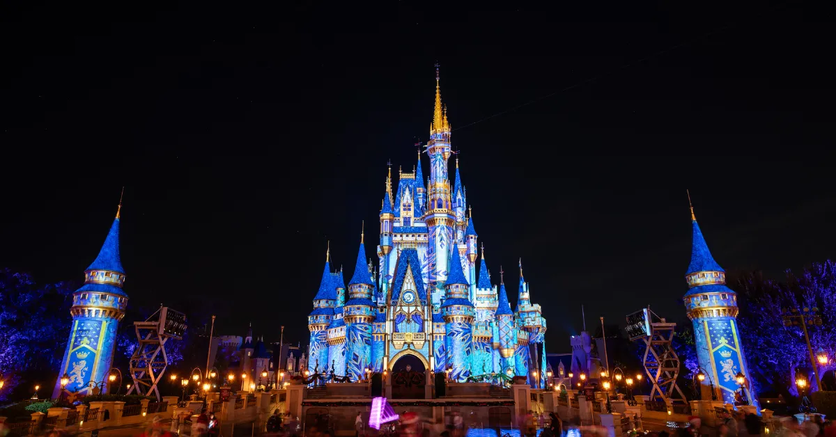 doing it all at disney world, cinderella castle christmas projections