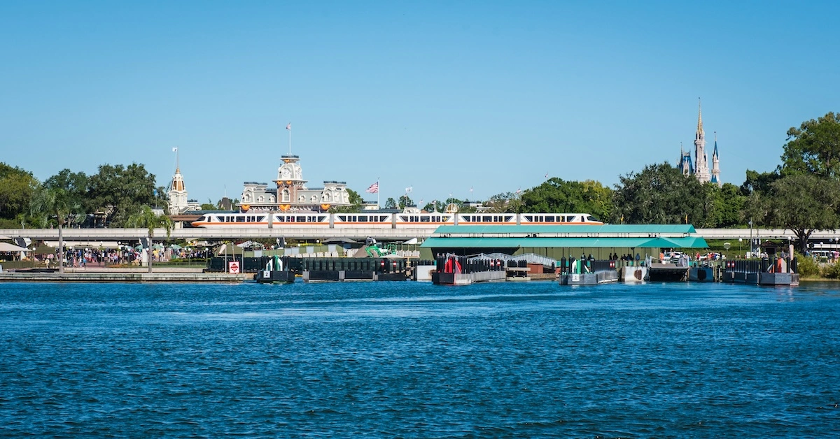 Laurie-3709 (FI) Magic Kingdom from ferry across Seven Seas Lagoon