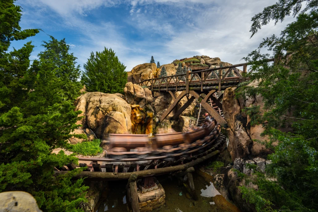 Seven Dwarfs Mine Train coaster in action