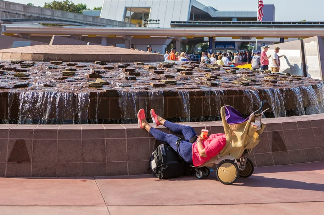 boy napping in stroller at epcot